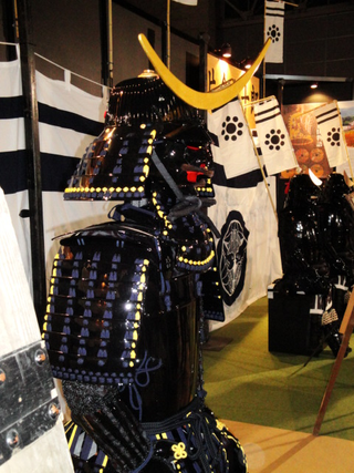 Illustration for article titled Booth Check: The Warlord Armor of TGS